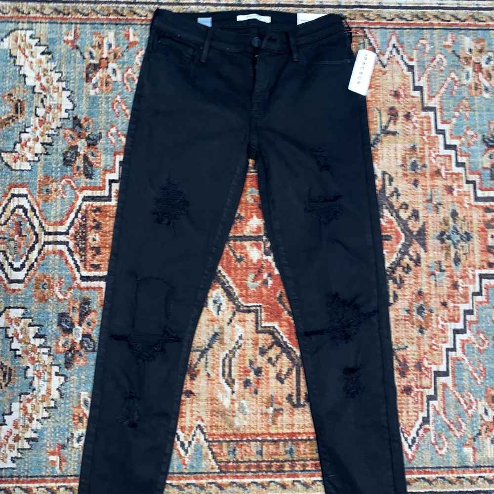 PACSUN Skinny ripped black jeans.